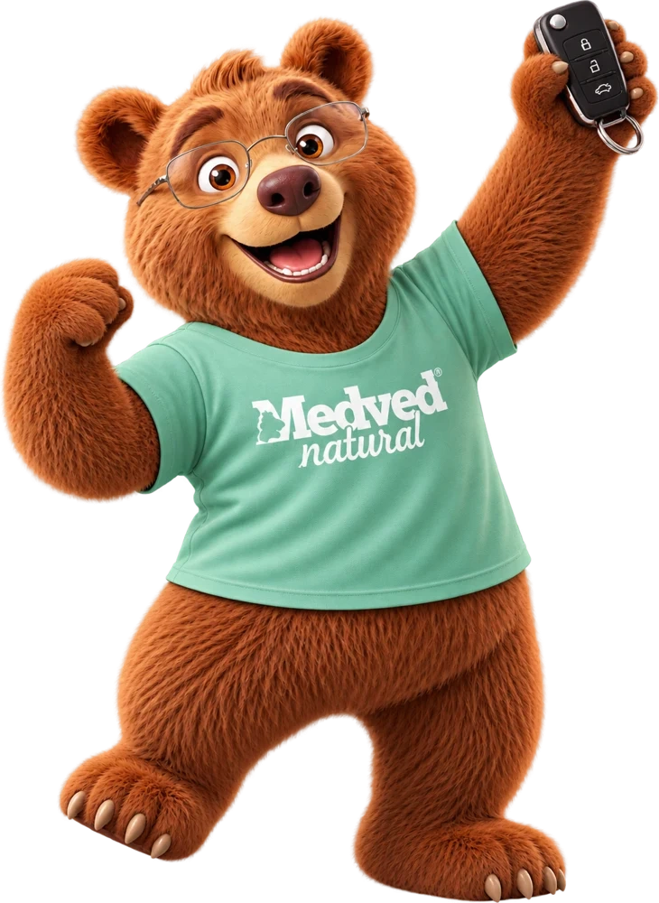Maskot Medveď nadšene drží kľúče od auta